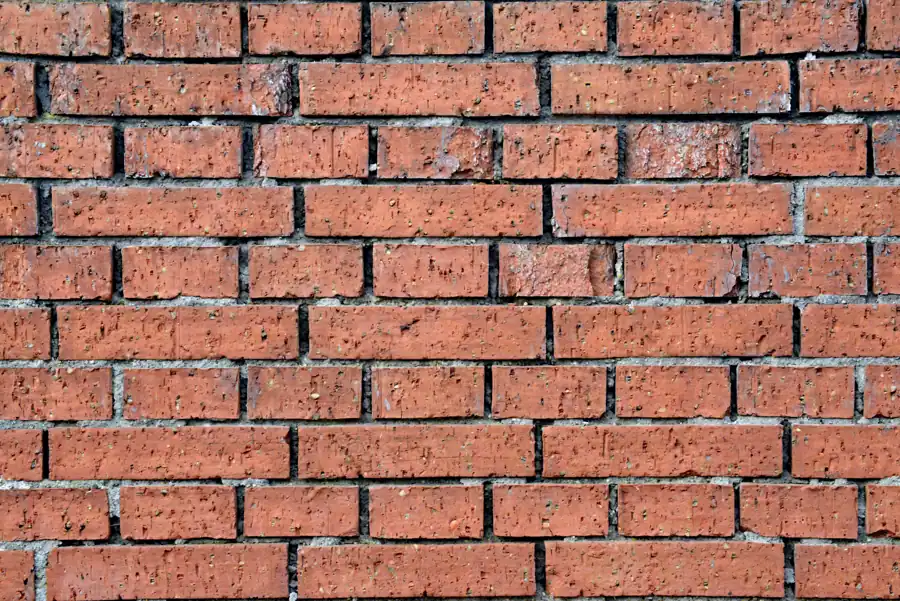 Detailed red brick wall background, perfect for texture and design use.